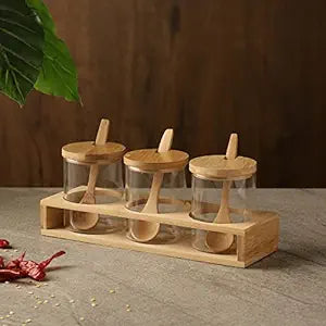Cp Glass Triple Condiment Jar and Spoon with Wooden Stand (Spoon-13 * 3 * 0.4cm/Glass with lid-6.5 * 6.5 * 9.5cm/Stand- 24.5 * 8 * 4cm)