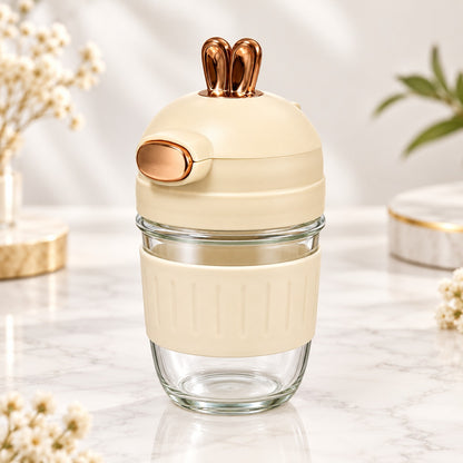Cute Bunny Ear Sipper Bottle with Straw, Flip Lid & Protective Sleeve – Cream Travel Tumbler